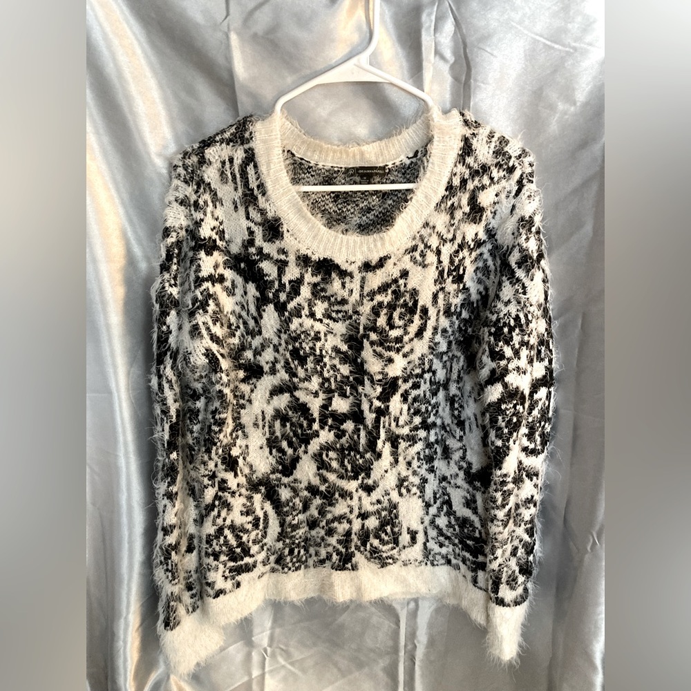 Size medium, fuzzy knit.